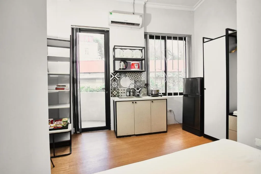 Suite có ban công — Eco Nest Hotel & Apartment